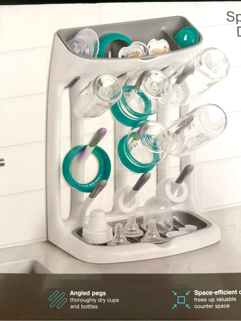 Oxo Baby Bottle & Bottle Accessories Drying Rack in Gray and White.